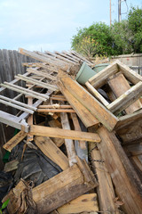 Construction debris after home remodel demolition on patrio deck