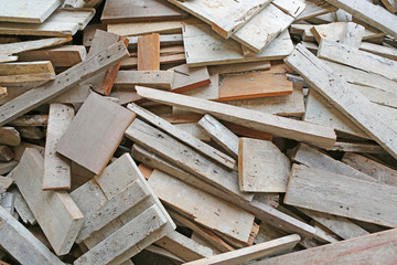Pile of old used timber planks.