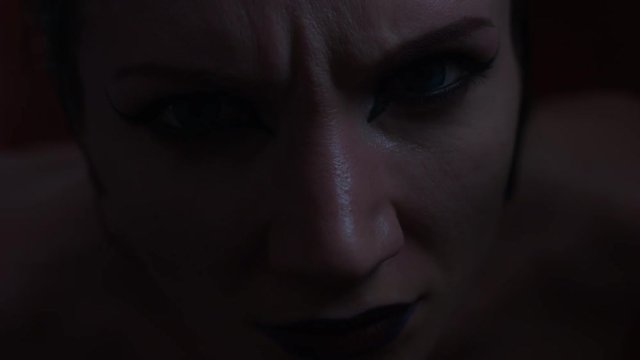 4k shoot of a horror Halloween model - Vampire looking evil with flashing light