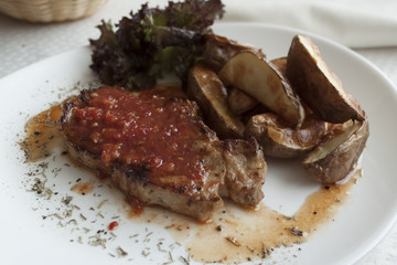 Meat under adjika-honey sauce