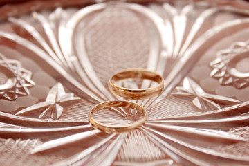 Gold wedding rings on a plate
