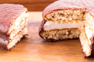 Macro view of the chocolate cookies with a layer of milk souffle