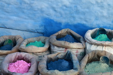 Sacks full of colored pigments