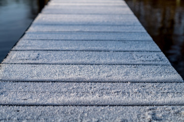 Obraz premium detail, closeup of a frozen boating dock