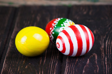 Easter eggs on wood desk. 