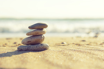Fototapeta na wymiar Spa stones on the beach
