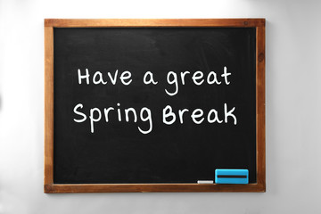 Text HAVE A GREAT SPRING BREAK on blackboard. Additional education concept