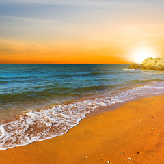 quiet sunset over a sea coast