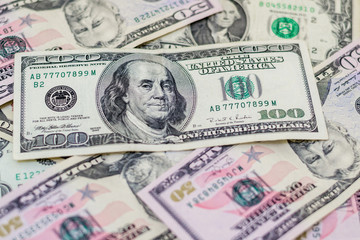 Mixed US dollars, a lot of money background. Finance, business