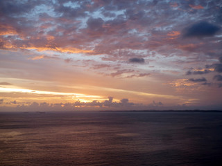 Fototapeta na wymiar Colorful sunset at Bay of All Saints in Salvador, Bahia - Brazil