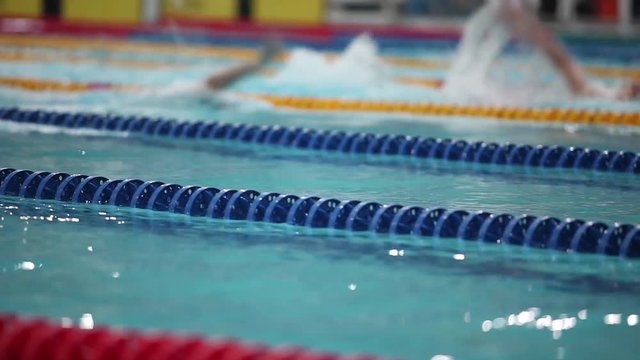 swimming backstroke in a race