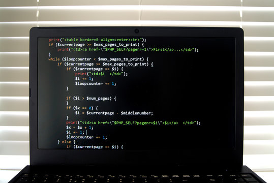 Laptop screen with computer code