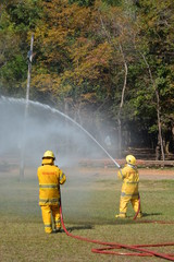 the firefighter are in demonstrative to the fire