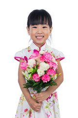 Asian Chinese little girl wearing cheongsam holding carnations f