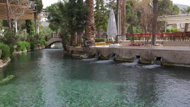 Tourist attraction Cleopatra's antique geothermal pool and hot spring at the Hierapolis in Pamukkale Turkey