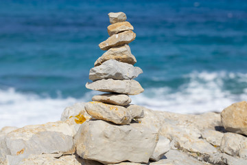 Fototapeta na wymiar Stack of stones on the seaside