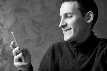 Young man with his mobile phone