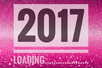 Happy new year 2017 words on shiny pink glitter background