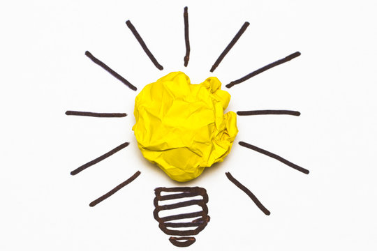 Inspiration concept crumpled paper light bulb metaphor
