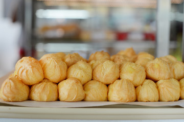 Choux cream France  bakery ,Profiteroles, choux with a custard cream, creme anglaise, whipped cream, dessert