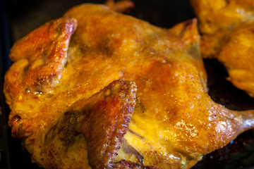 Roasted chicken on iron pan, food
