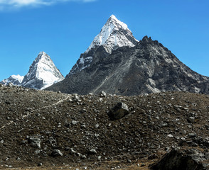 Nirekha (6169 m), Kangchung (6062 m), and Chola (6069 m) in the area of Cho Oyu - Gokyo region,...
