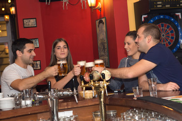 Friends having drinks in a bar