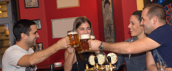 Friends having drinks in a bar