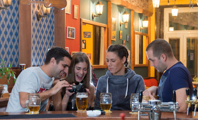 Friends having drinks in a bar