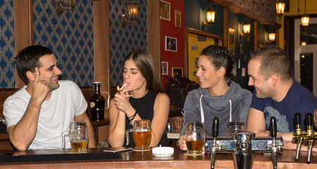 Friends having drinks in a bar