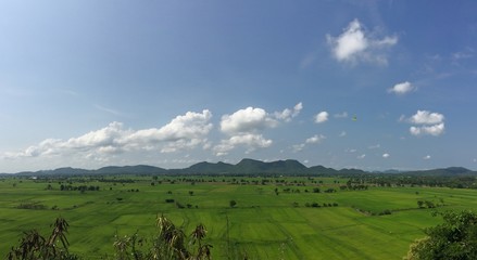 Obraz premium Dream holiday destination, rice fields and mountain panorama view in the blue sky sunny day in southeast Asia, Thailand,