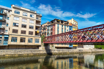 Colorful houses and Eiffel bridge in Girona