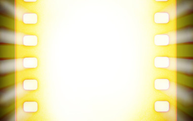 Cinema film strip and projector light rays.