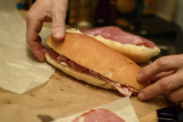 Obraz na płótnie Canvas Making Pannini with Italian Meats
