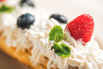 Fresh raspberry on white cream