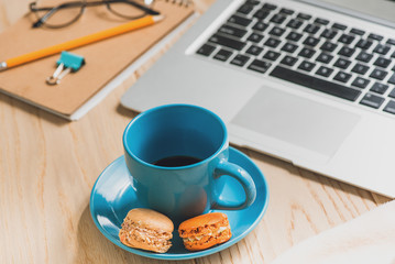 Sweet cookies on plate with coffee