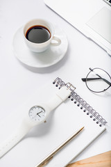 Cup with coffee at working atmosphere