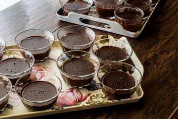 Homemade Chocolate Puddings in glass cups.