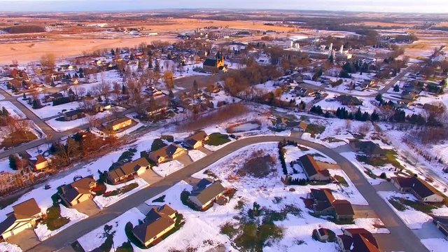 New neighborhoods, suburbs, showing growth of small town.
