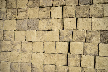 clay adobe blocks placed in the Sun for drying
