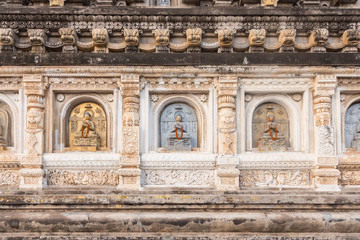 Fototapeta na wymiar Decorated panel around pagoda at Mahabodhi Temple, Gaya, India