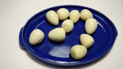quail eggs in the blue bowl