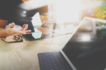 two colleague web designer discussing data and digital tablet do