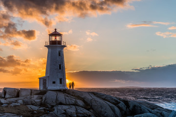 Peggy's Point sunset with couple silhouette