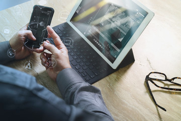 Businessman hand using mobile payments online shopping,omni chan