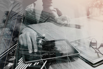 Double exposure of Doctor working with digital tablet computer w