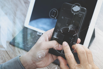 Hand using mobile payments online shopping,omni channel,icon cus