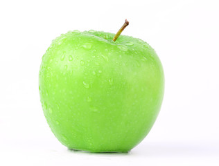 Juicy green apple isolated on white in studio - XXL file with selective focus.