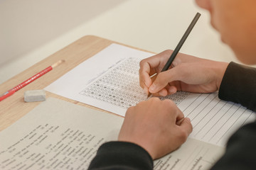 blurred of Thai student testing in exercise, exams answer sheets