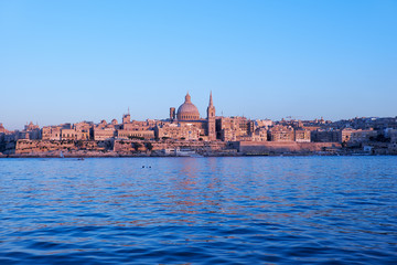 Fototapeta na wymiar The evening view of Valletta skyline from Sliema. Malta